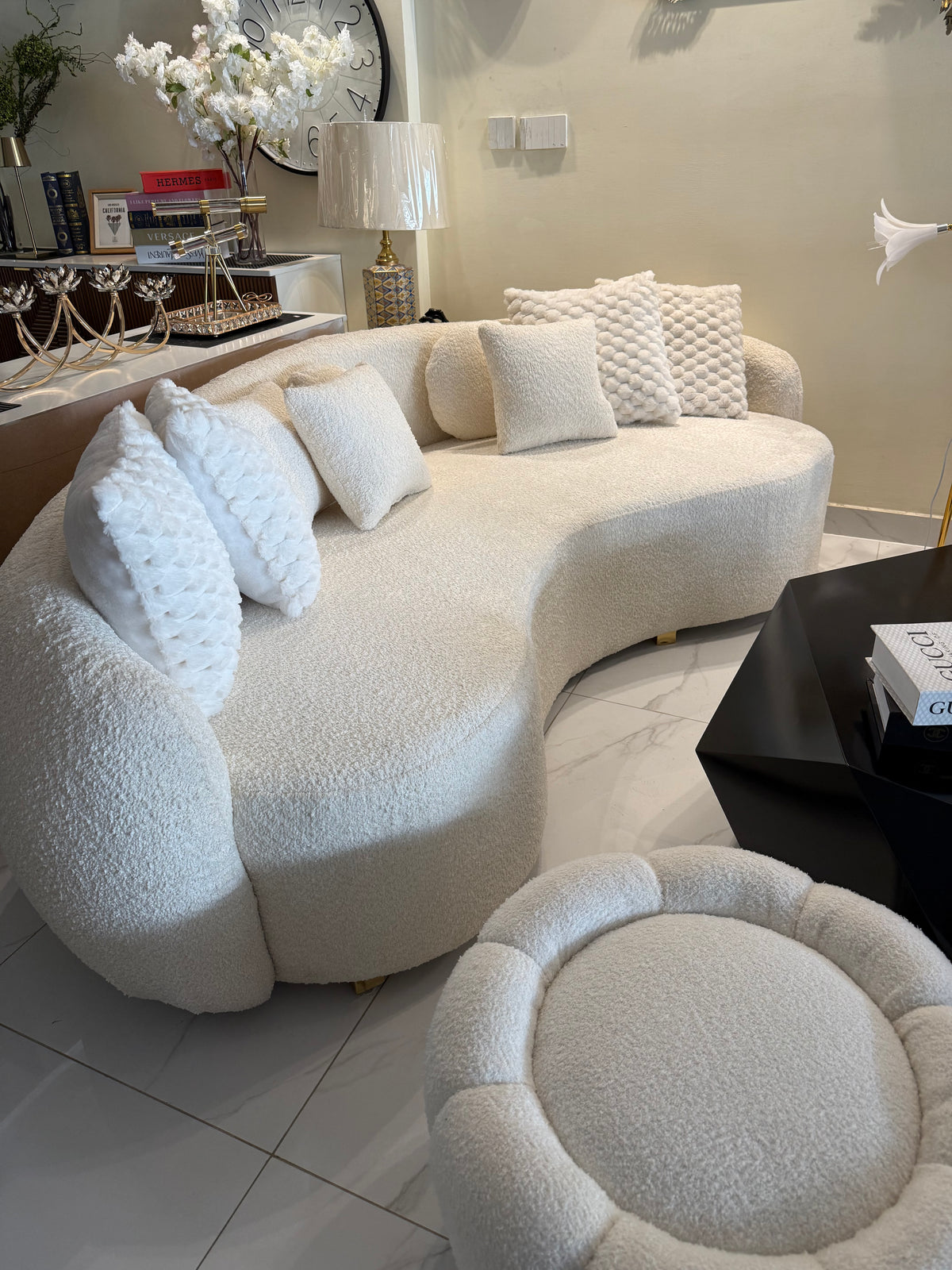White boucle curved sofa