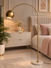 Golden globe lamp with marble base