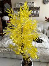 Yellow leaf Plant with textured Planter