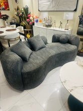 Grey Isle boucle curved sofa 02