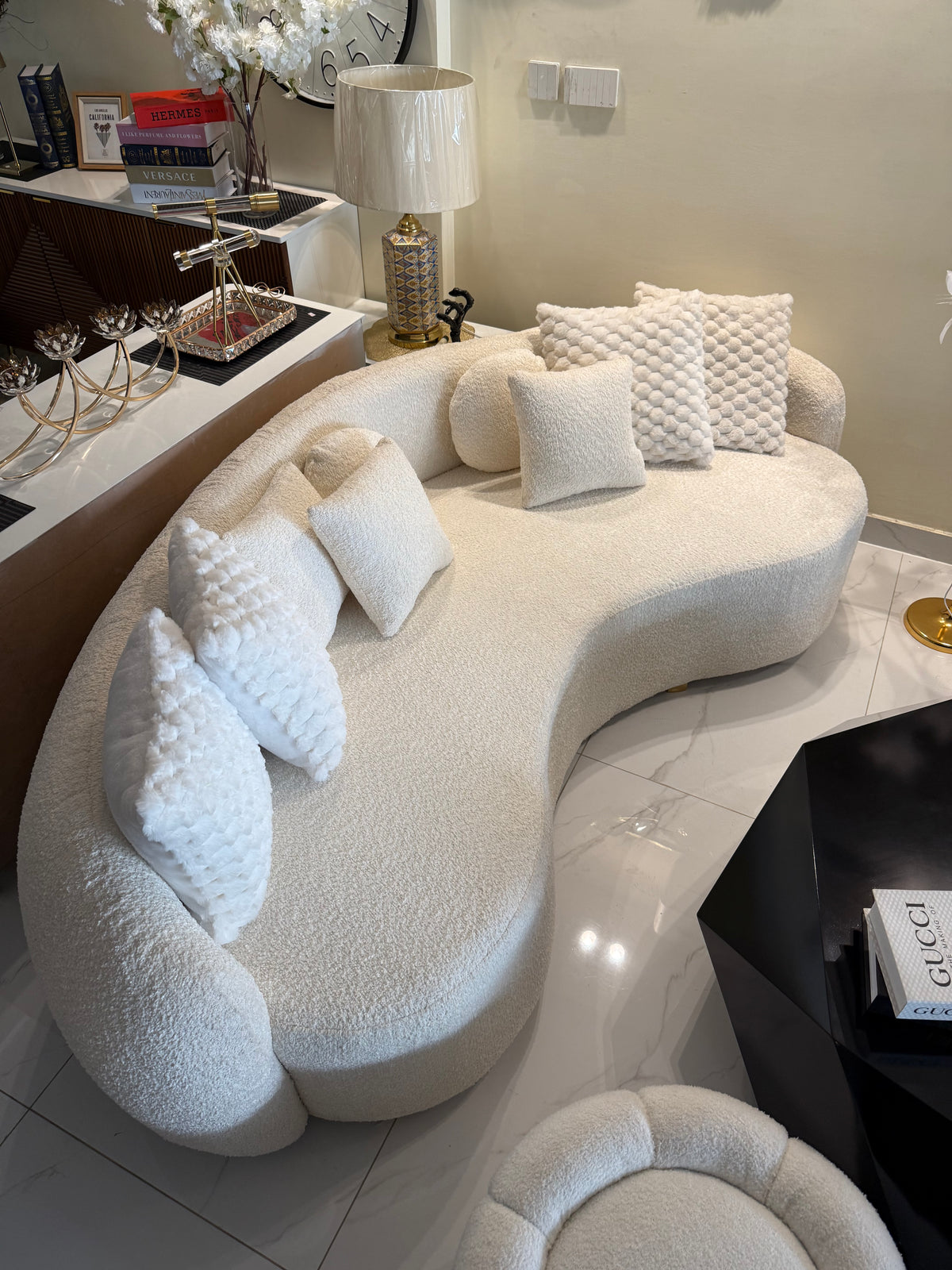 White boucle curved sofa