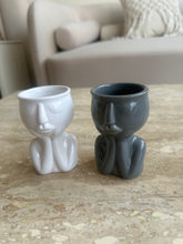 Sleeping man candle stand