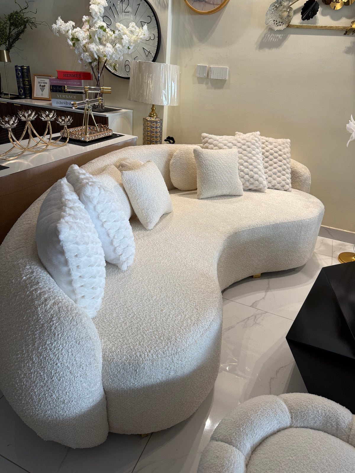 White boucle curved sofa