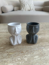 Sleeping man candle stand