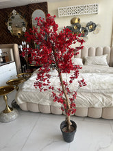Faux Eucalyptus Maroon flower Plant (medium) with Hugo planter Black