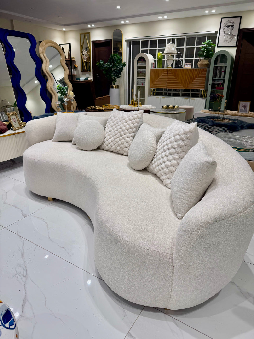 White boucle curved sofa