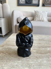 Black Hooded Sculpture