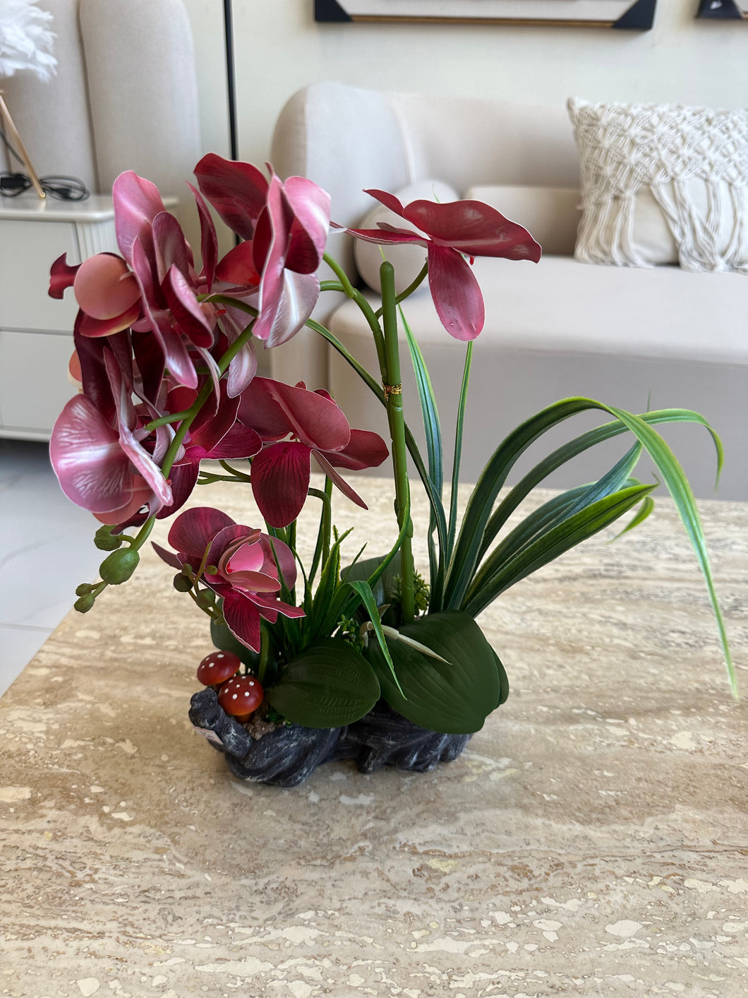 Maroon orchids flower arrangement